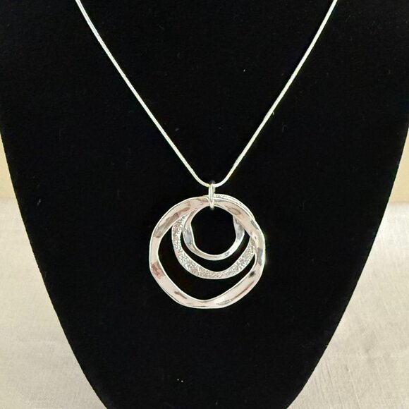 Silvertone Necklace 22-24 inches with Pendant Trio of Irregular Textured Rings - Picture 2 of 6